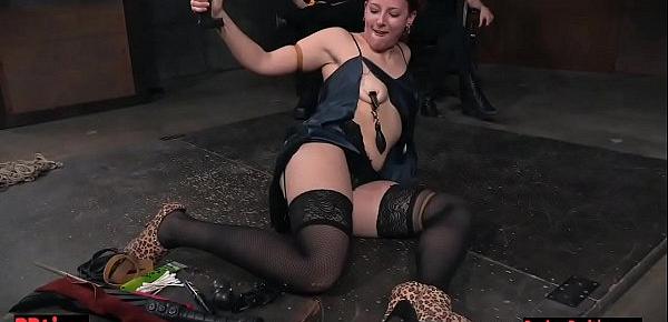  Restrained bdsm babe balances while clamped